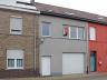 Totaal gerenoveerde woning gelegen nabij station Denderleeuw. Omvat: glvl: inkomhall, ruime garage v