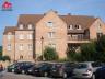 Appartement duplex situé au centre de Wavre : hall, living, cuisine équipée, 2 chambres dont une en 