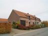 Landelijk gelegen hoeve ( bewoonbare oppervlakte 452m² en terrein van 14are 07ca ) te koop. Deze hoe