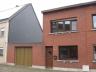 Rustig gelegen woonhuis met twee slaapkamers, garage en kleine koer, binnen de ring van Herentals. G