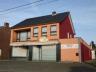 Handelspand met 200 m² commerciële ruimte, bovenliggend appartement met 2 slaapkamers, en achtergele