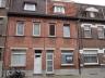 Nette rijwoning met stadstuintje, rustig en centraal gelegen nabij scholen, winkels, openbaar vervoe