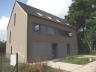 Zeer ruime half-open nieuwbouwwoning in het centrum bestaande uit: gelijkvloers: inkomhall, wasplaat