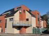 Nabij het centrum van Tessenderlo gelegen dakappartement bestaande uit inkomhall, ruime woonkamer me