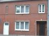 In het centrum gelegen woning (GB) bestaande uit: Ruime inkomhall, living in 2 delen (laminaat; 1Â: 