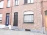 Instapklare gezellige rijwoning met 3 slaapkamers, mooie west-tuin met terras en veranda en een gara