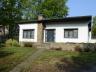 Centraal gelegen woning in open bebouwing op een omheind perceel van 12are80ca. Vlotte verbinding na