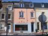 Immeuble de rapport comprenant un rez commercial(93 m² - commerce, remise, bureau, cuisine, wc) et 2