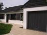 Villa de plain-pied située proximité du centre et des écoles Compr.: hall living avec fo véranda cui