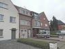 Ruime op te frissen woning, bestaande uit: GV.: Inkom, ruime garage, toilet, wasplaats, grote polyva