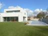 Exclusieve nieuwbouwvilla in een residentiële wijk te St. Andries, mooie oprijlaan met carport, ruim