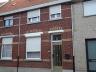 Instapklare woning bestaande uit inkom met trap, ruime living, open en ingerichte keuken, ingerichte