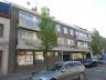 Centraal gelegen en zeer ruim appartement  bestaande uit inkom, vestiaire, toilet, zeer ruime living
