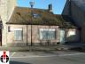 Inkom met toilet - Living met haard - Badkamer met bad, douche & lavabo - Volledig ingerichte keuken