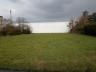 Prachtige bouwgrond op ca. 1.600 m² gelegen langs N 70. 30 m straatbreedte.