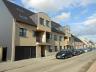 Prachtig recent duplex appartement met terras en garage (120m²). De woning omvat: Living / eetplaats