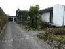 Mooi gelegen bungalow.  Inkom en wc. Living met open haard en eethoek.  Ingerichte keuken met eethoe
