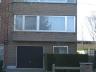 Stijlvol klassiek ingerichte HOB met mooie zuid tuin. Gelijkvloers : Inkomhal met vestiaire, oprit n
