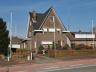Deze woning is momenteel opgedeeld in 2 woongelegenheden, maar kan omgevormd worden tot één gezinswo