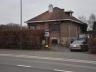 Open bebouwing met solide constructie, die te renoveren is met ruime tuin, palende aan groene zone. 
