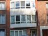 Appartement met zeer gunstige ligging : inkomhall, living, keuken (wordt volledig vernieuwd !), badk
