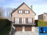 Roosdaal (Strijtem) : Klassieke villa, gebouwd in 1980 op een perceel van bijna 15 are. De woonkamer