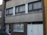 Goed onderhouden ruime stadswoning - 8 m. gevelbreedte - glv.: gang, bureau, toilet, garage, ruime l