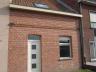 Volledig gerenoveerde woning. Deze instapklare gezinswoning omvat inkomhal, woonkamer met open keuke