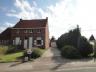 Volledig gerenoveerde HOB woning op 461 m² grond. Gelijkvloers: Living ca. 35 m² met speksteenkachel