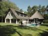 Sfeervolle villa gelegen in bosrijke, residentiÃÂle omgeving. Deze villa heeft een mooie inkomhal me