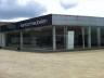Ideaal gelegen showroom te huur langs de E40, in het industriegebied  Drongen met een opp. van +/- 5