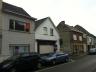 Handelswoning op een terrein van 3,39are met ruime atelier en appartement.Op het gelijkvloers beschi